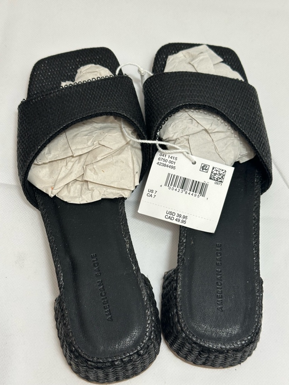 Brand new with tags American Eagle black woven slide sandals in women’s size 7.